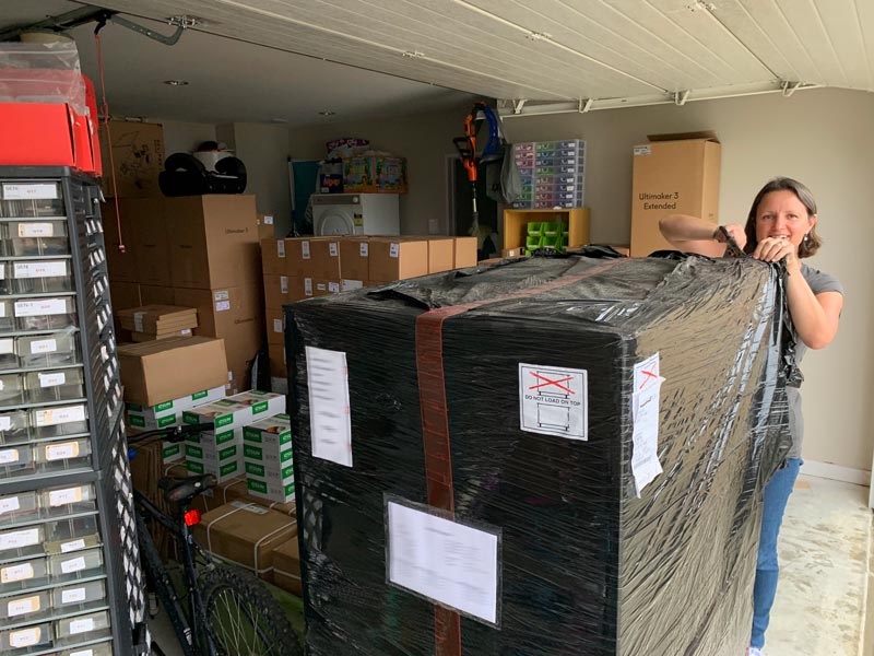 Fay unpacking a large box